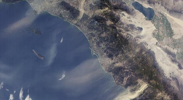 Santa Ana winds moving dust across Southern CA