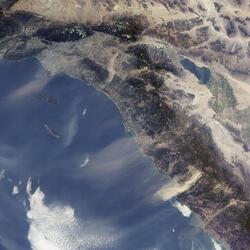 Santa Ana winds moving dust across Southern CA